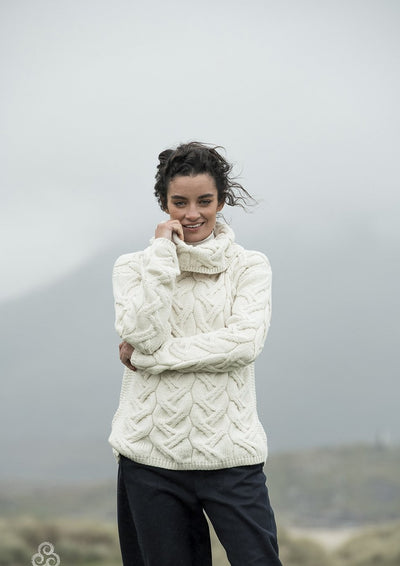 colour natural.long sleeves. cowl neck sweater. Extra soft wool. cable stitch all over . Hip length. Ladies Sweater.