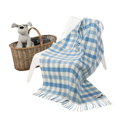 Blue and white chequered baby cashmere blanket with white wool fringing on 2 short edges.