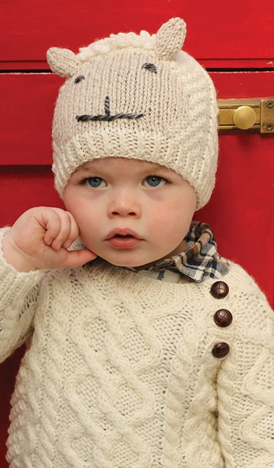 merino wool.handknit kids hat. smiley sheep face with ears on the main body of the hat .. colour natural and oatmeal