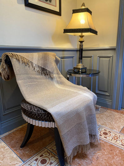 cream caramel and softest brown cashmere and wool blanket , fringing on either end and horizontal stripes of the softest beige colours.136 cm x 180cm