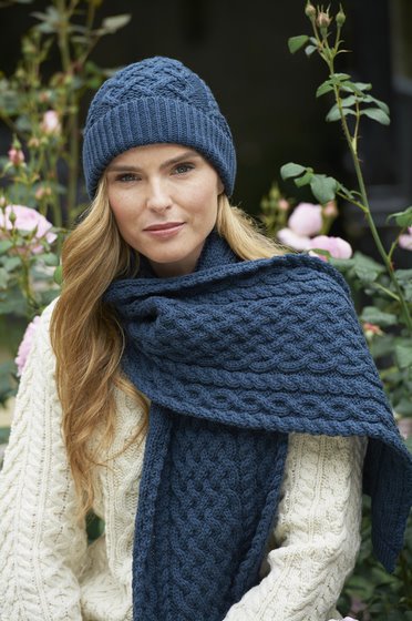 Extra soft scarf . unisex. lattice stitch on centre panel . Cable stitch runs along outer sides and diamond stich runs along the side if the lattice stitch. Soft warm and breathable. Hat to match available. Lattice cable scarf. colour teal blue